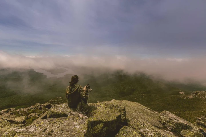 A mountain landscape beneath an open sky